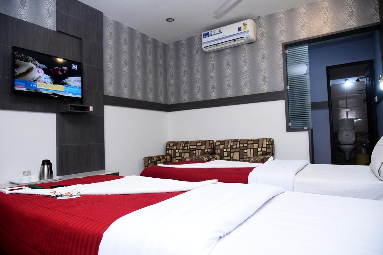 Hotel Grand Choice à Bangalore Chambre photo